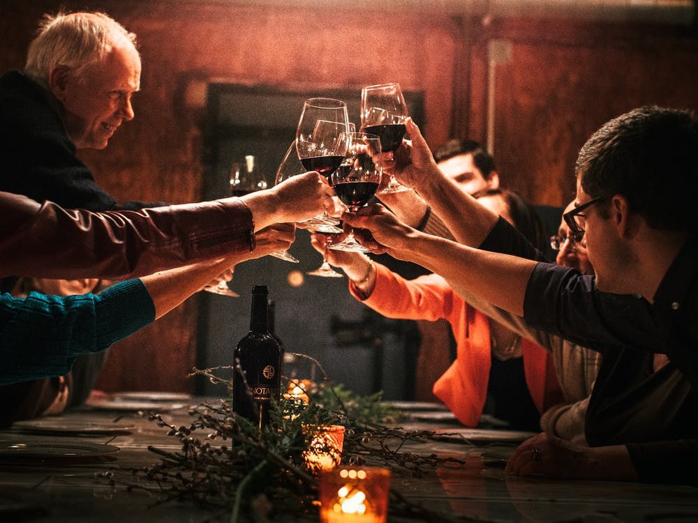 a man holding a wine glass