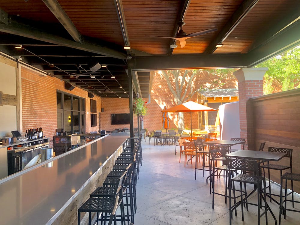 a dining room table in front of a building